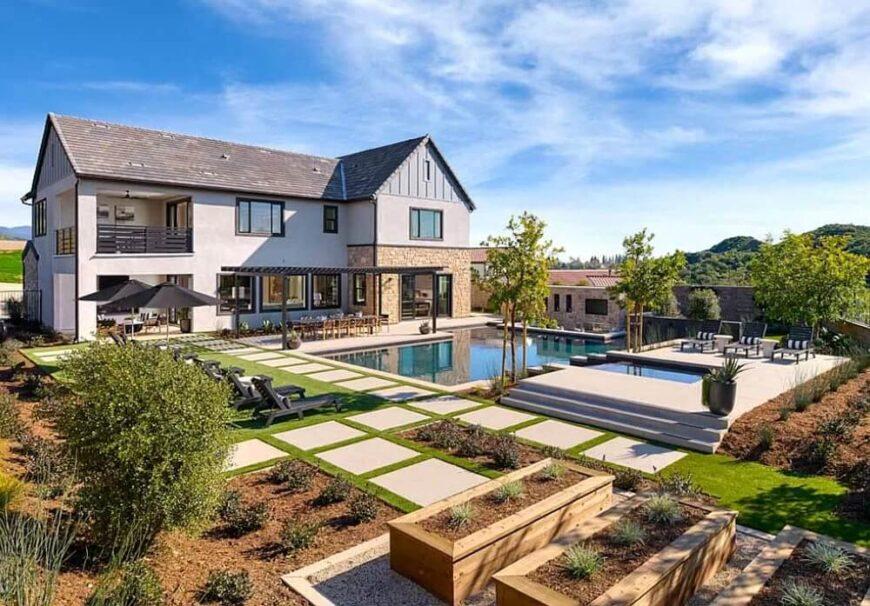 Explore This Chic Backyard with a Sleek Infinity Pool Design