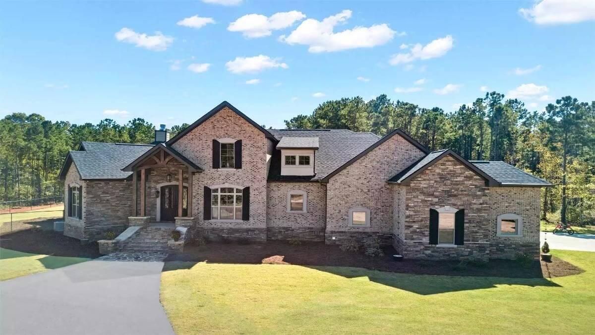 Classic Stone Facade and Gable Roof Make This Home Stand Out