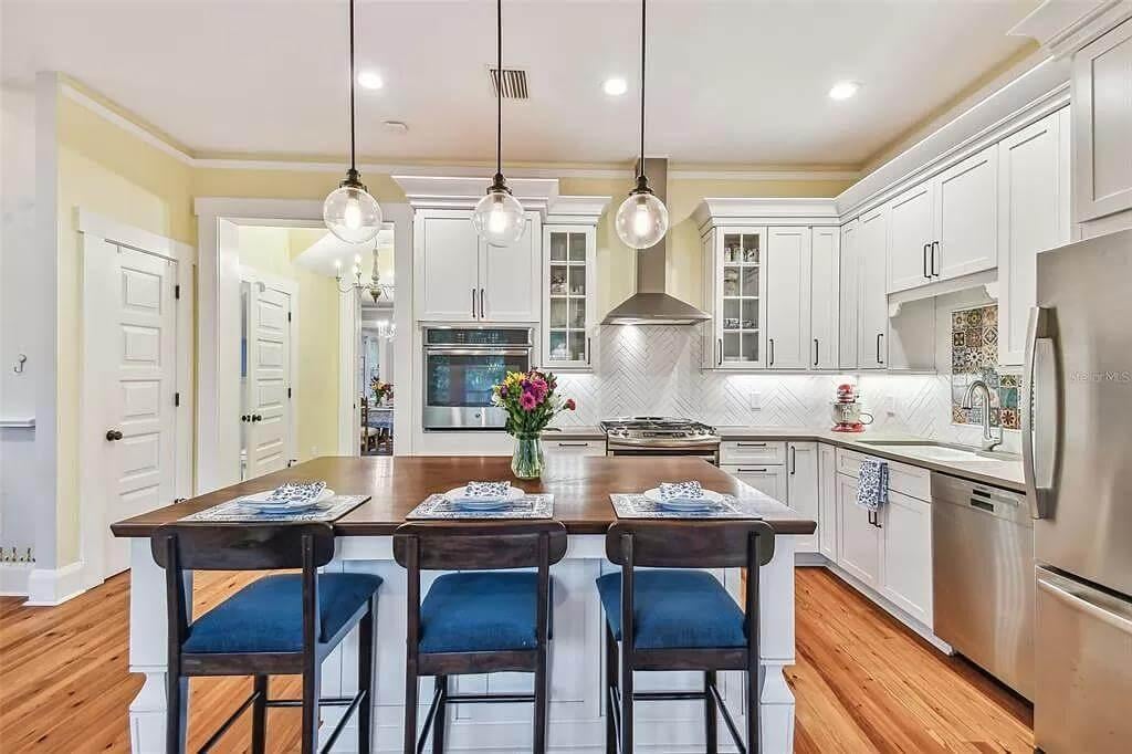 Notice the Striking Pendant Lights That Elevate This Kitchen