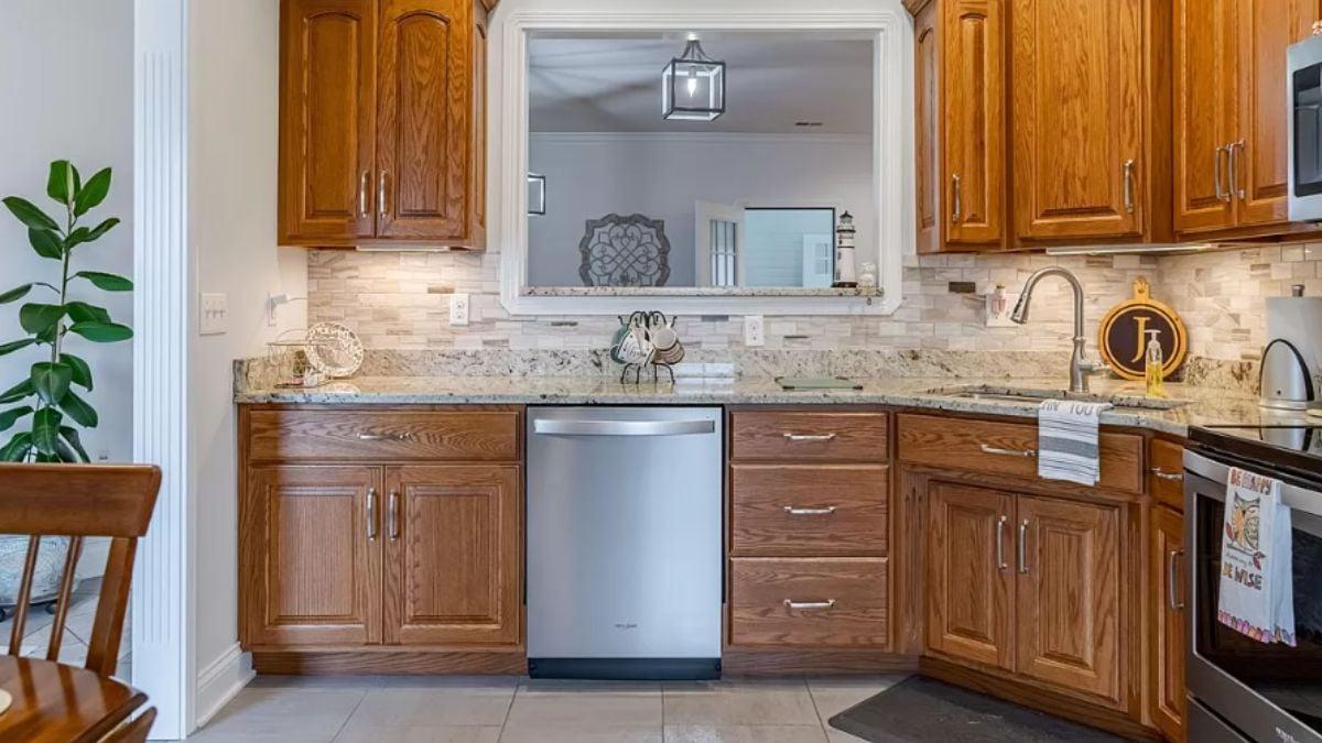 Admire the Craftsmanship of These Rich Wood Cabinets