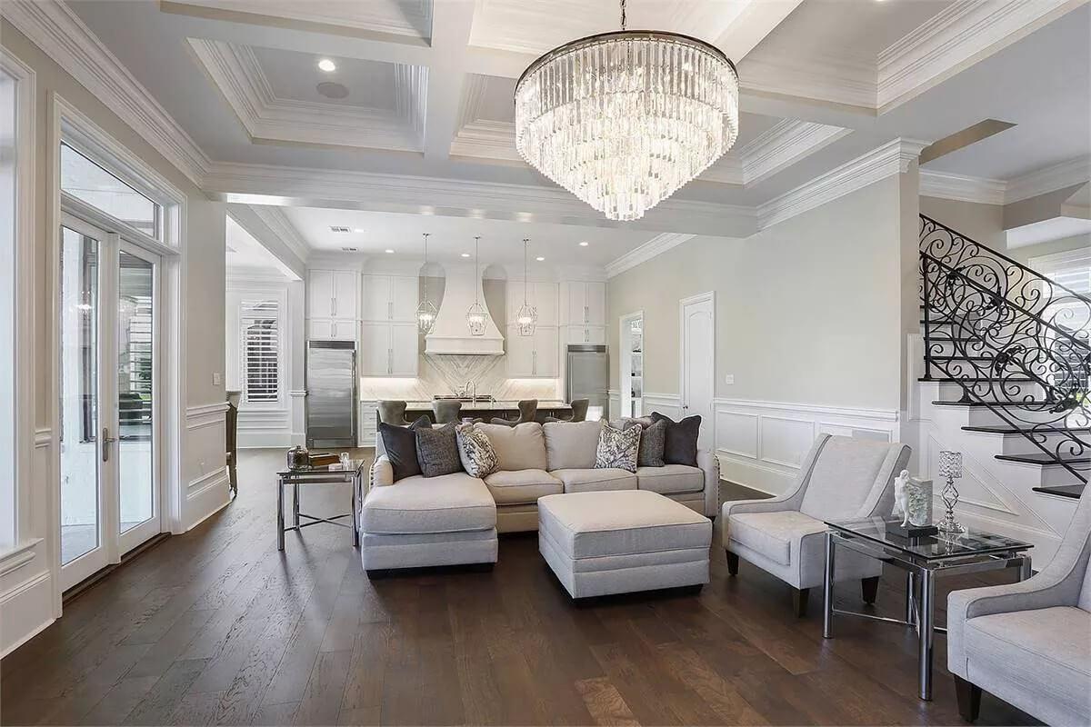 Check Out the Elegant Staircase Complementing This Open Living Area