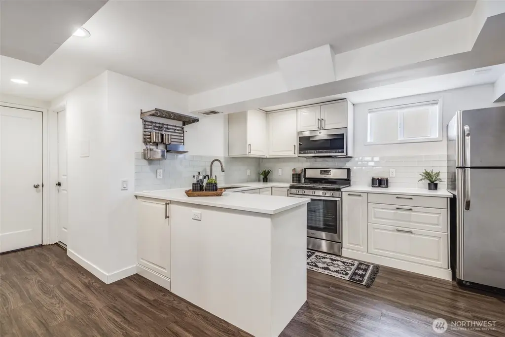 Cape Cod Style 5-Bedroom Home with Open-Concept Layout and Lower Level ADU (2,400 Sq. Ft. Floor Plan)