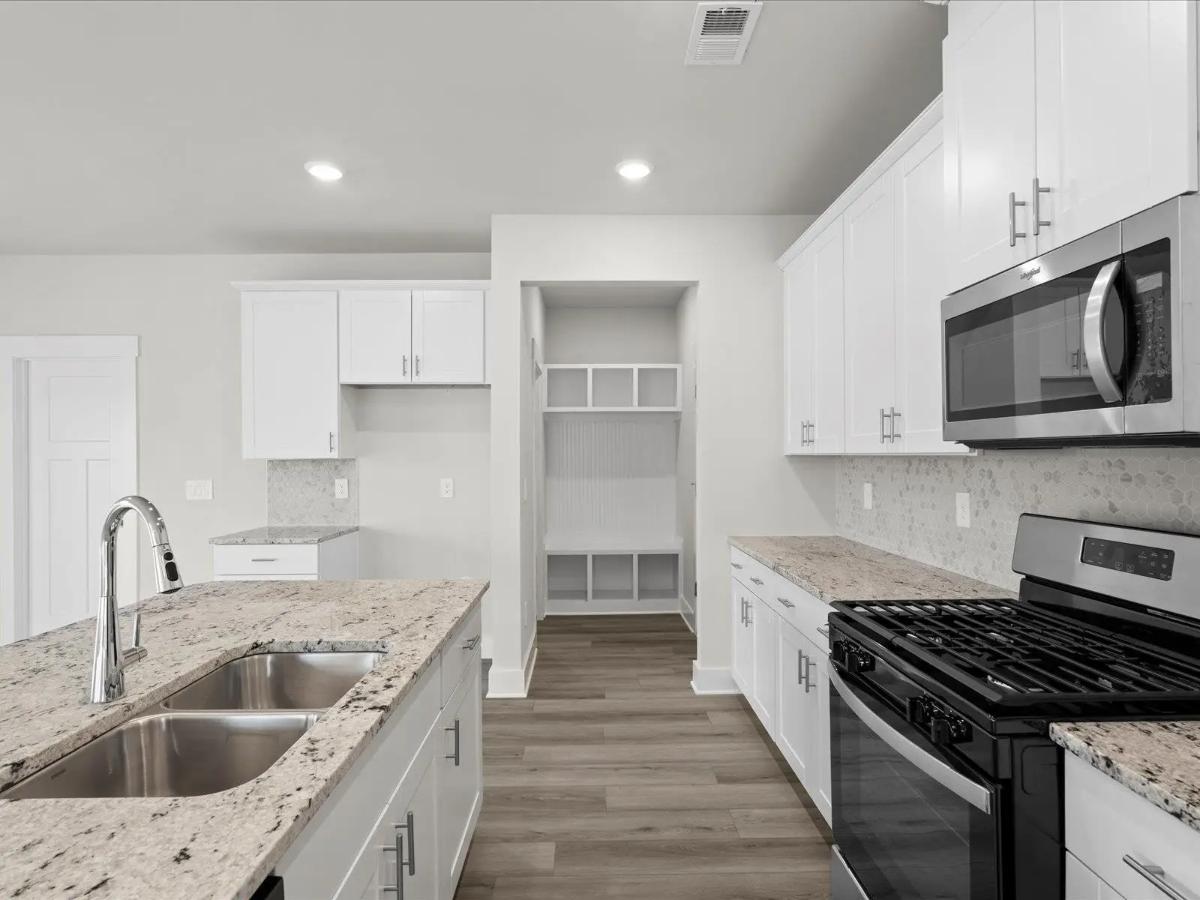 Craftsman-Style 4-Bedroom Home with Covered Patio and Two-Car Garage (2,345 Sq. Ft. Floor Plan)