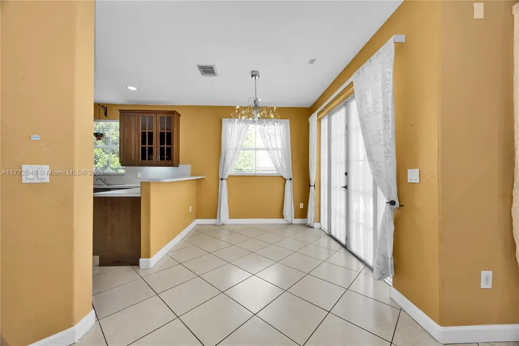 Mediterranean 4-Bedroom Revival-Style Home with Covered Patio and Two-Car Garage (2,747 Sq. Ft. Floor Plan)