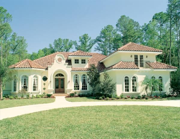Mediterranean-Style Home with Distinctive Arched Windows