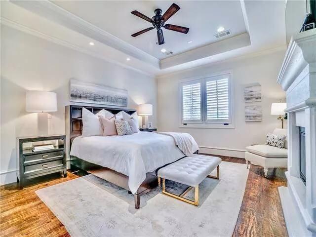Subtle Elegance in a Master Bedroom with a Stylish Ceiling Fan