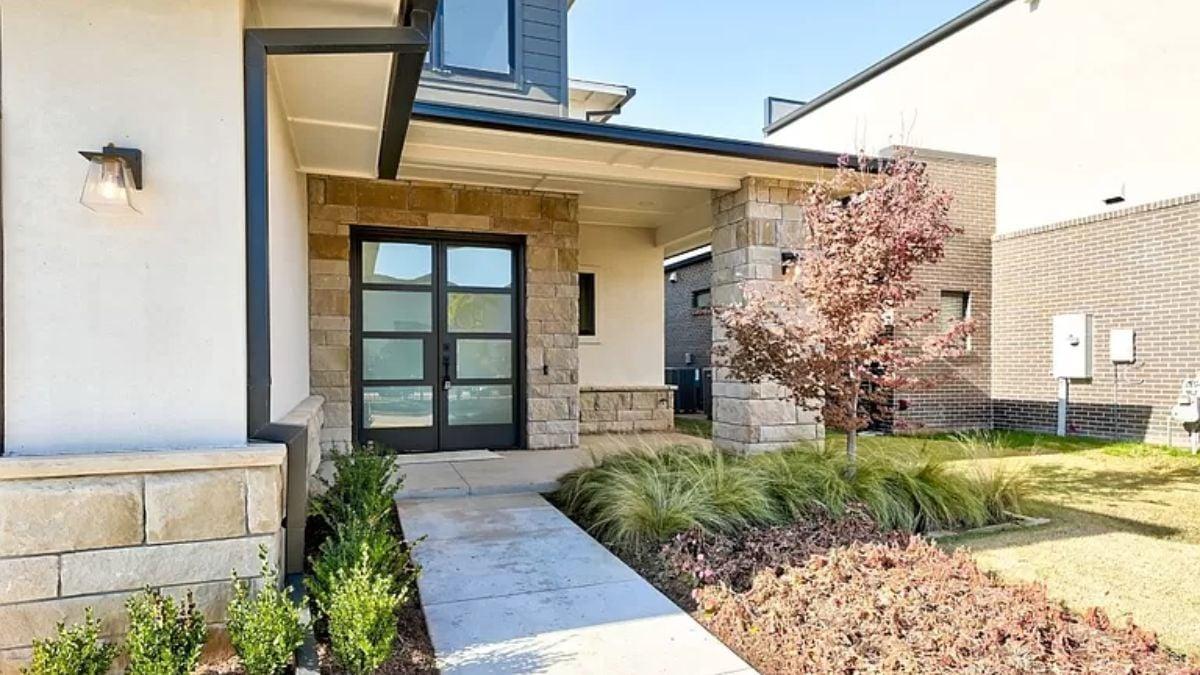 Notice the Stone Accents Framing This Contemporary Entrance