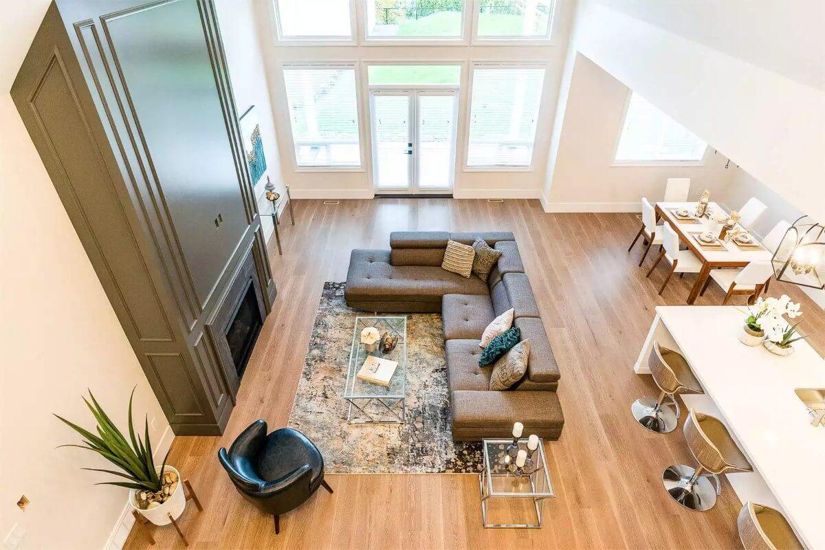 Wow, Look Down! The Spacious Open Living Area and Its Towering Windows