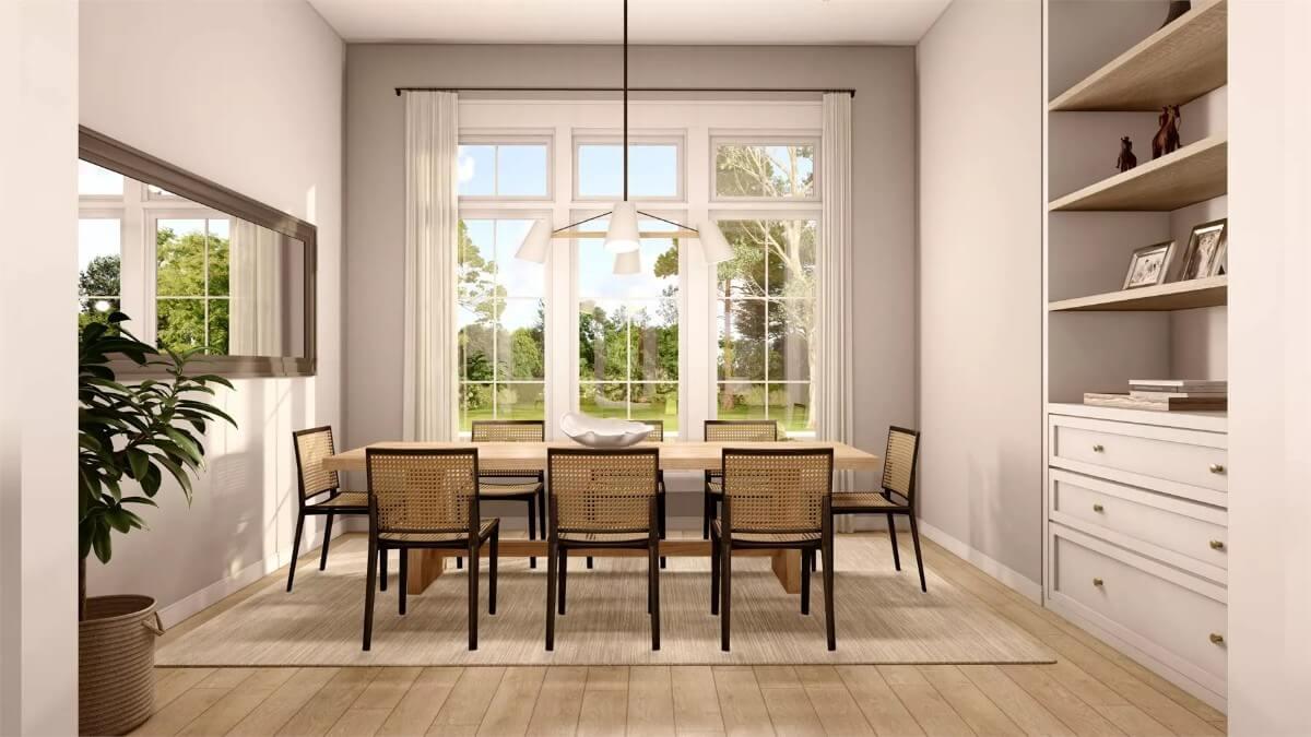 Admire the Natural Light in This Craftsman Dining Room with Cane-Back Chairs