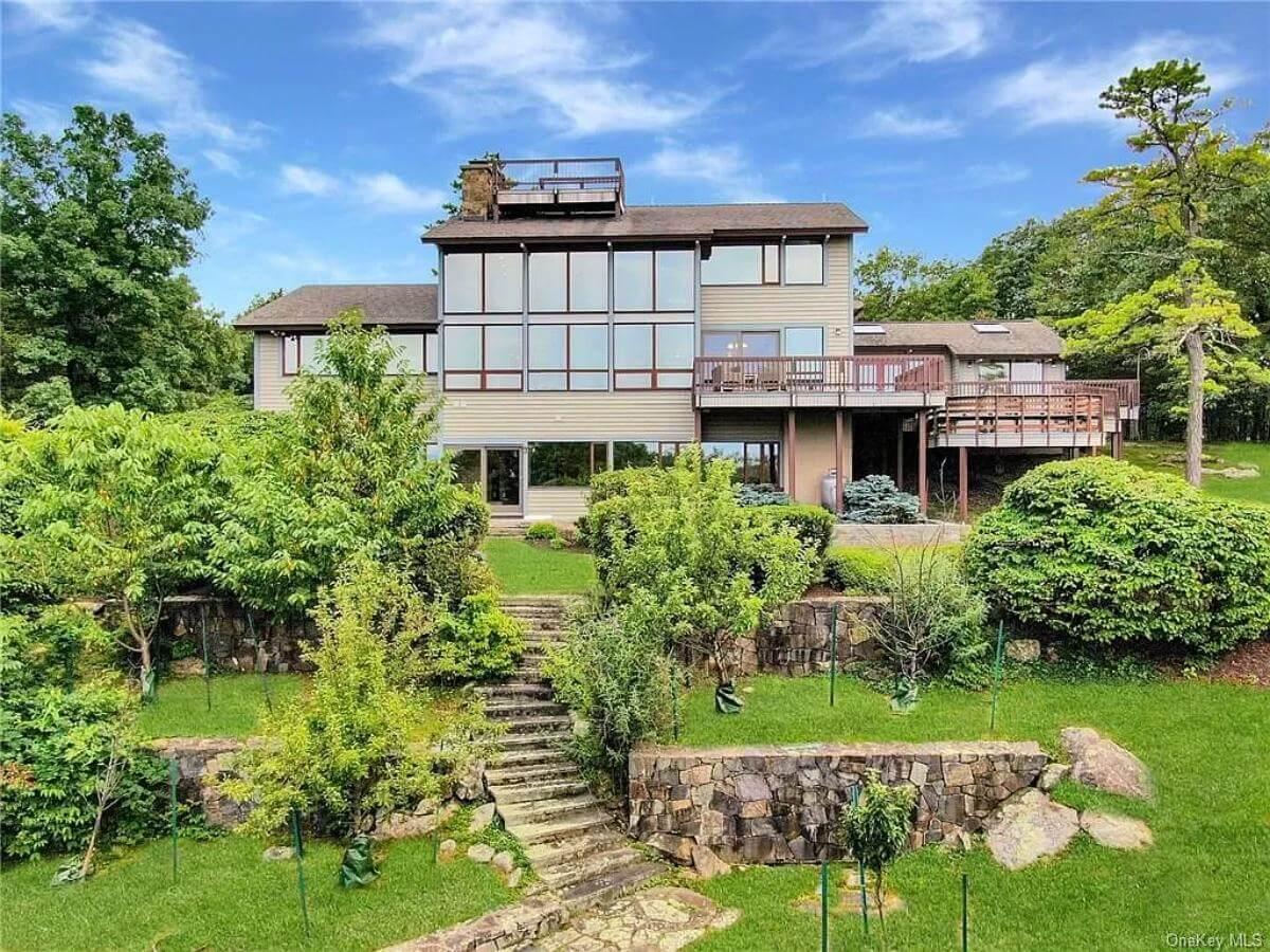 Look at the Vast Windows in This Multi-Level Serenity Retreat
