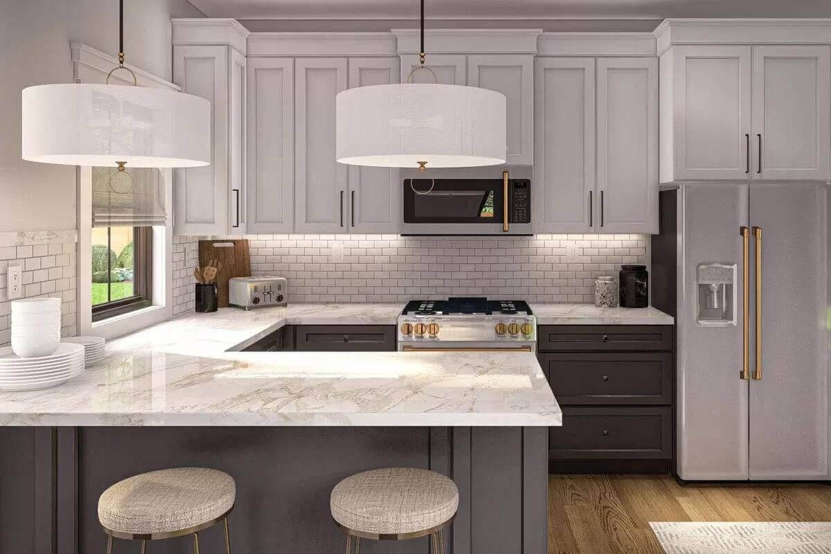 Check Out the Marble Countertops and Elegant Pendant Lighting in This Kitchen