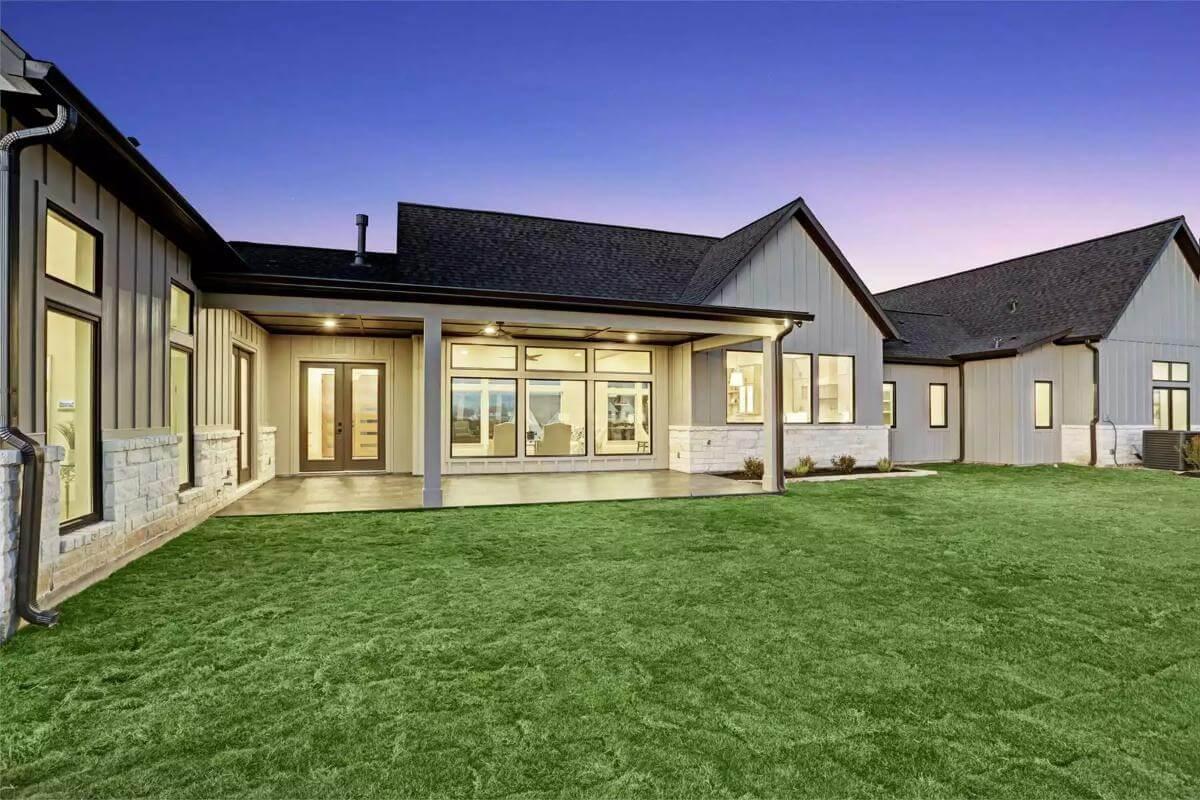 Check Out the Expansive Patio and Window Arrangement in This Modern Ranch