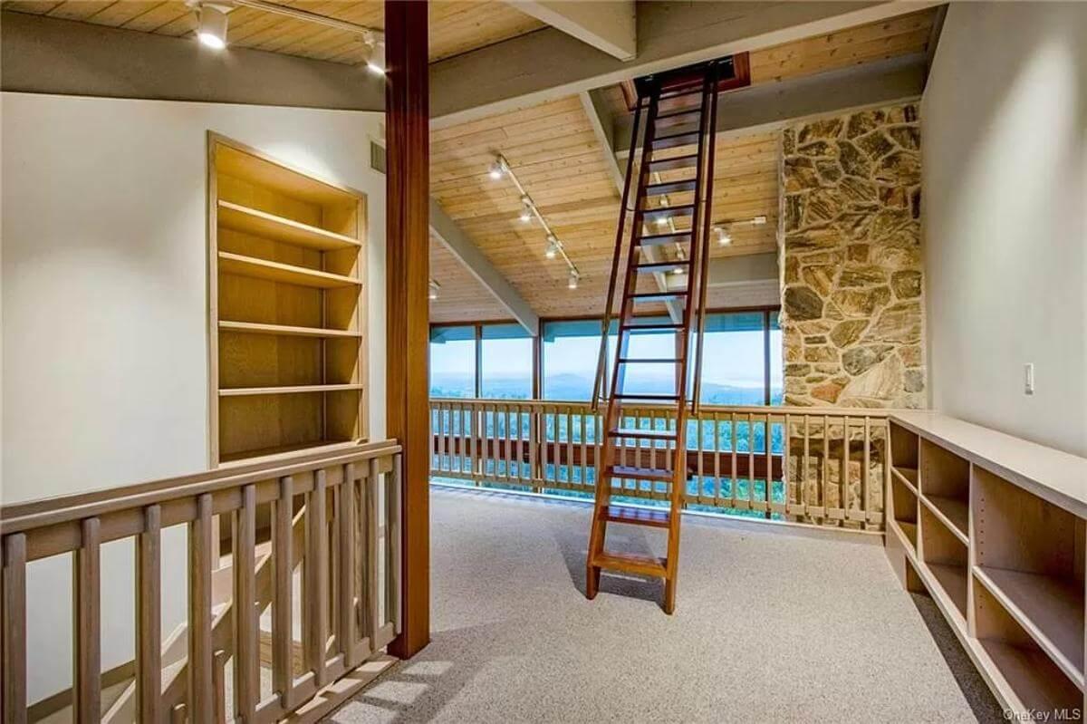 Step Up to This Loft with Stunning Views and Natural Stone Accents