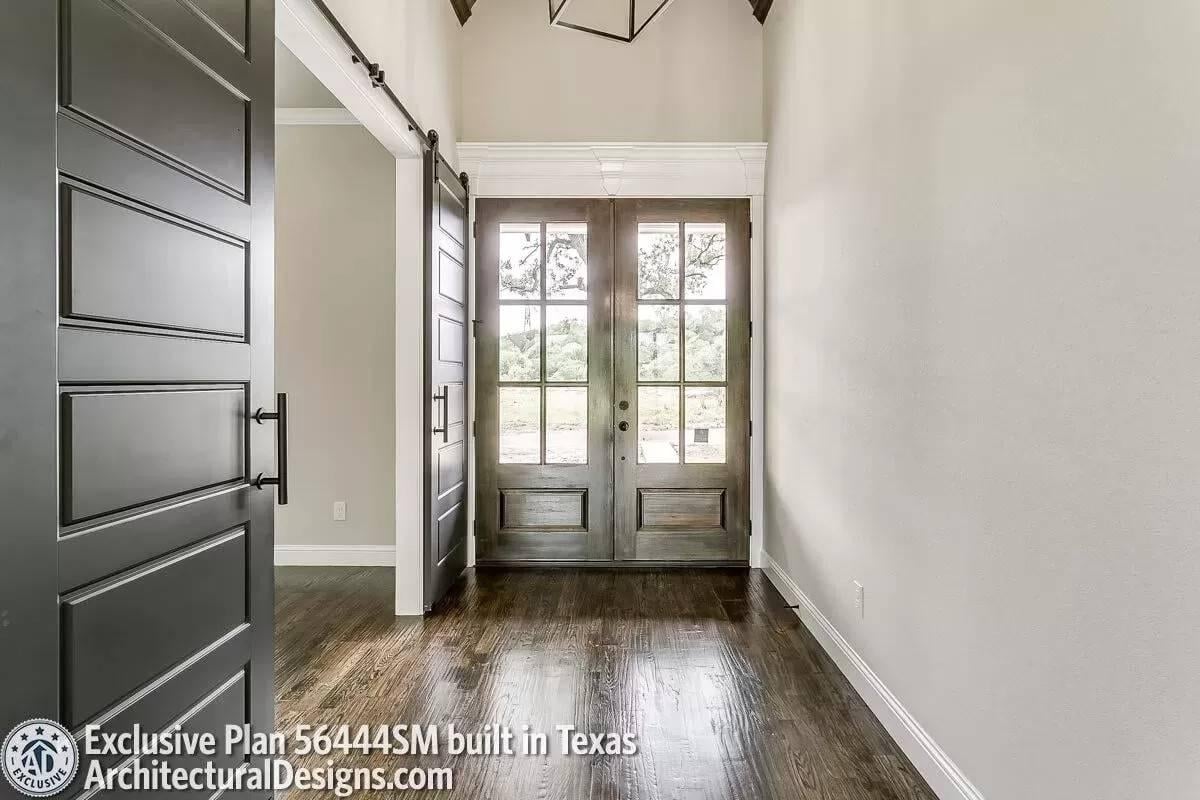Wooden Double Doors Welcome You into This Bright Entryway