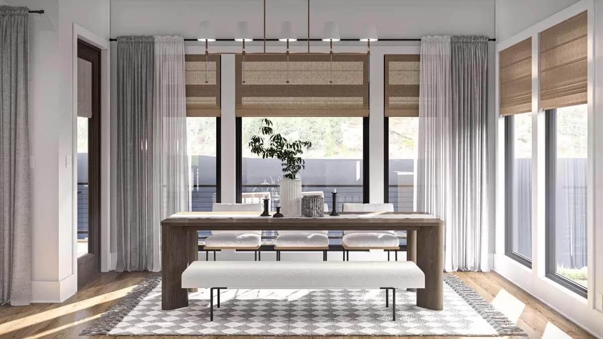 Contemporary Dining Space with Expansive Glass and Layered Textiles