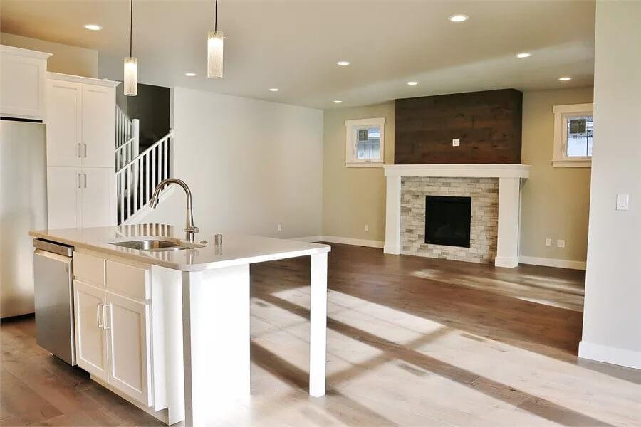 Living Room with Clean Lines and a Sleek White Island