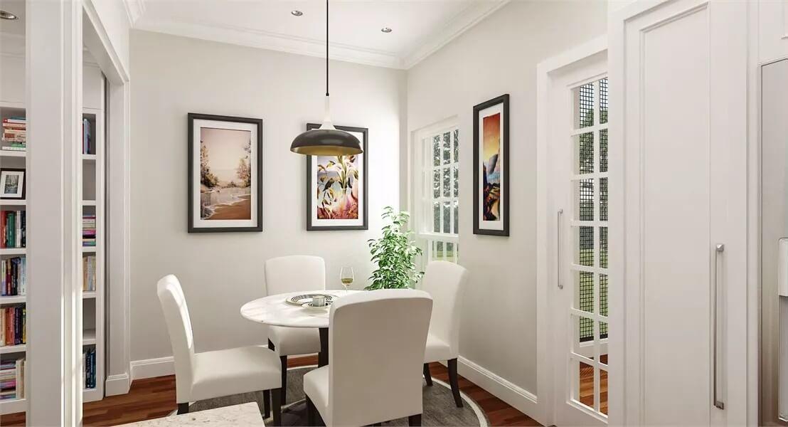 Cozy Breakfast Nook with Artful Flair and French Doors