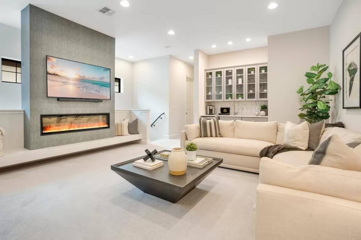 Check Out That Sleek Fireplace Wall in This Modern Lounge