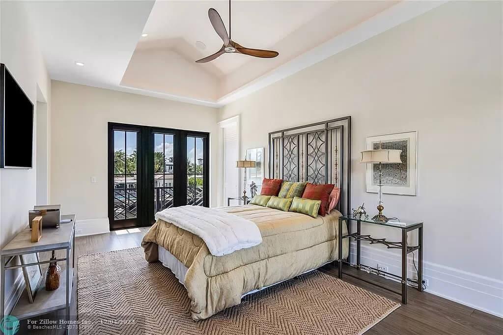 Notice the Tray Ceiling and Sleek Lines in This Relaxing Bedroom