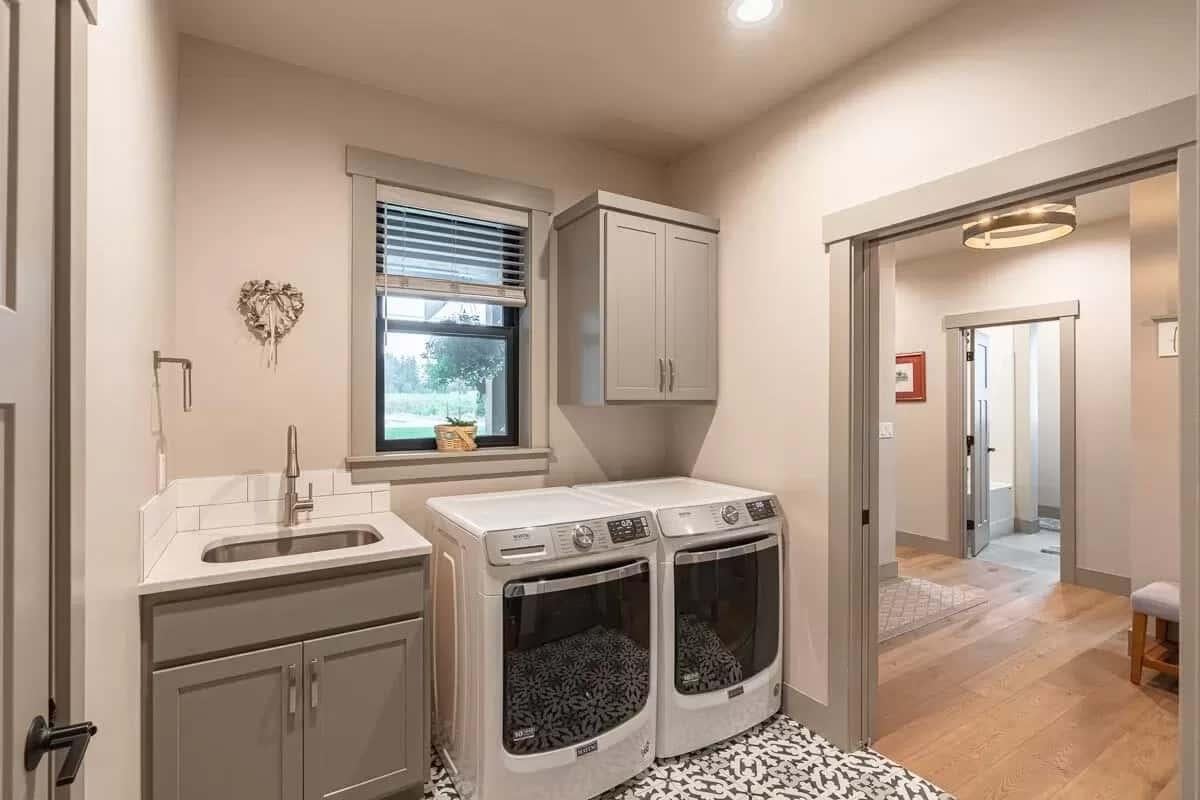 Efficient Laundry Room with Eye-Catching Tile Floor