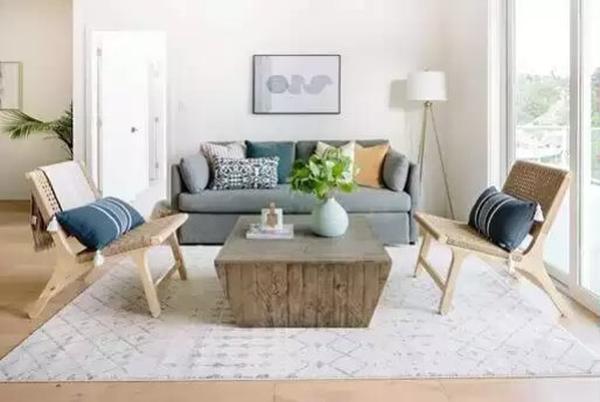 Take a Look at This Minimalist Living Room with a Rustic Coffee Table
