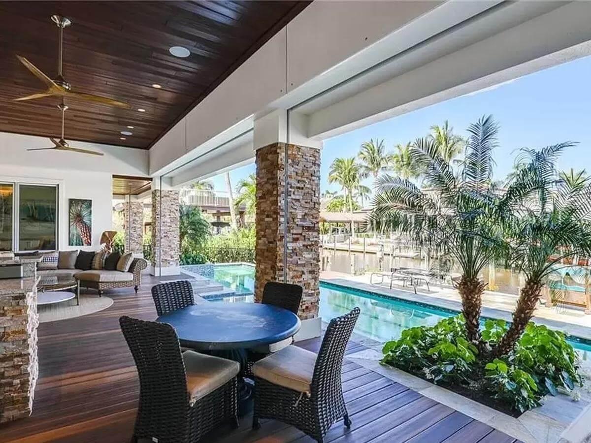 Wow, Look at the Rich Wood Ceiling and Stone Columns on This Lanai