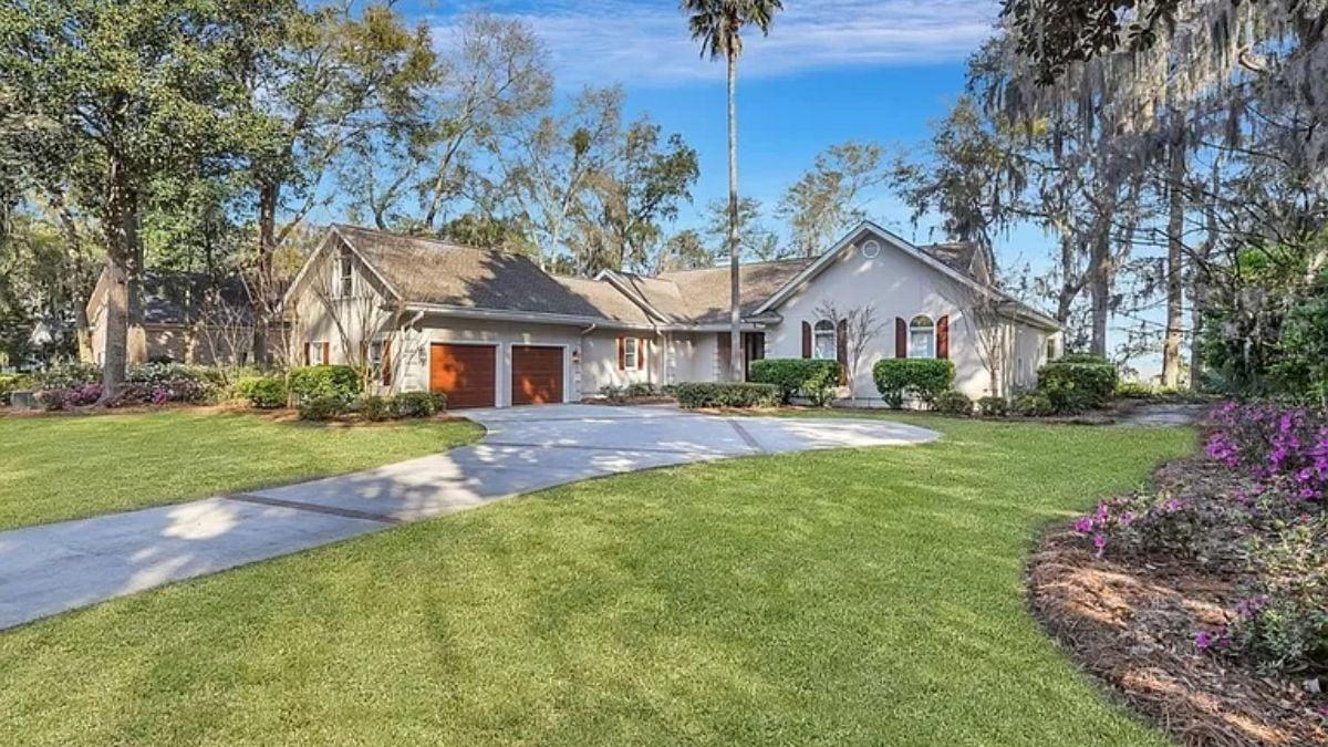 Craftsman Charm with Eye-Catching Wooden Garage Doors