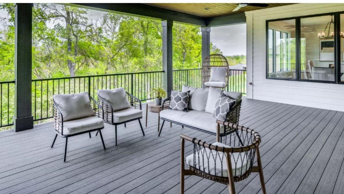 Experience the Harmony of Wicker Furniture on This Spacious Deck