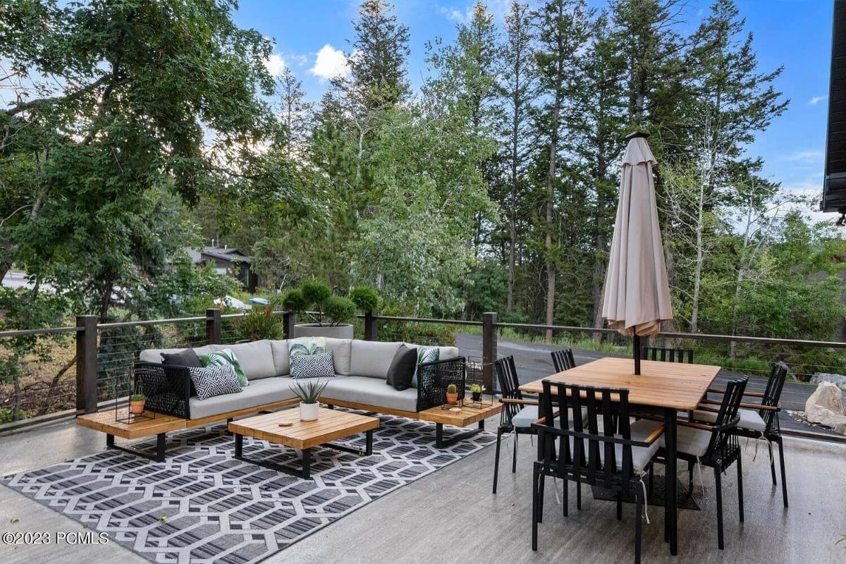 Modern Outdoor Living Space with a Bold Geometric Rug