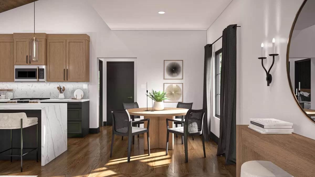 Round Dining Table Anchoring a Streamlined Kitchen
