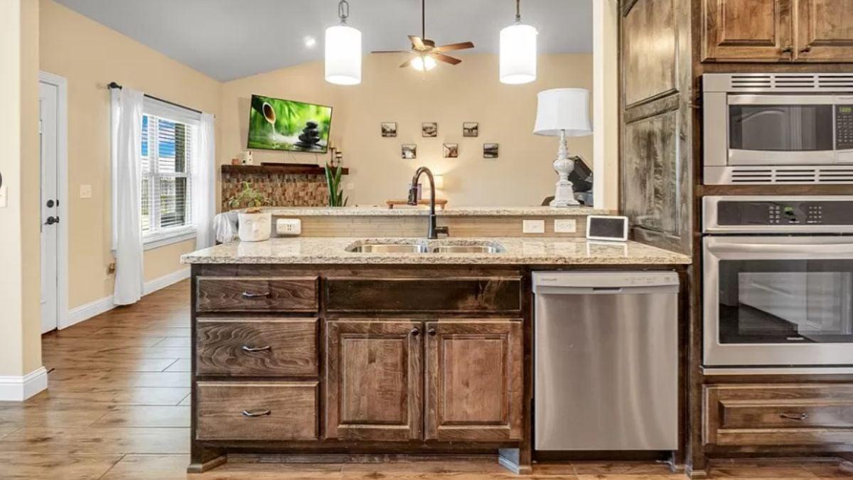 Rustic Kitchen Island with Granite Countertop and Dual Ovens