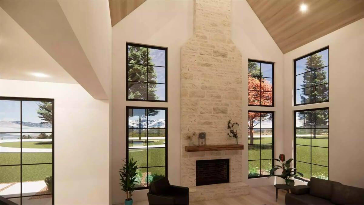 Marvel at the Stone Fireplace Anchoring This Light-Filled Living Room