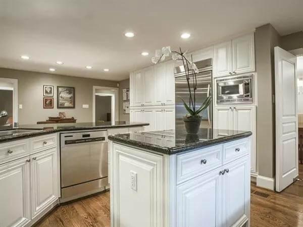 Check Out the Sleek Granite Countertops in This Functional Kitchen