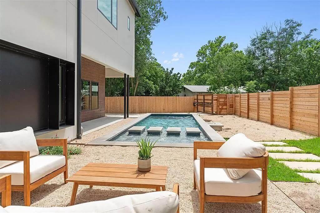 Unwind by This Modern Poolside Lounge