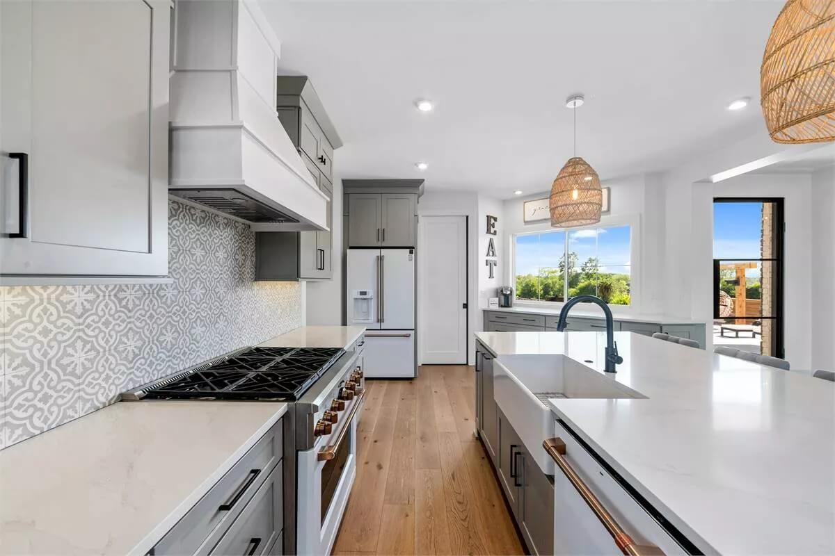 Check Out the Stylish Tiled Backsplash in This Light-Filled Kitchen