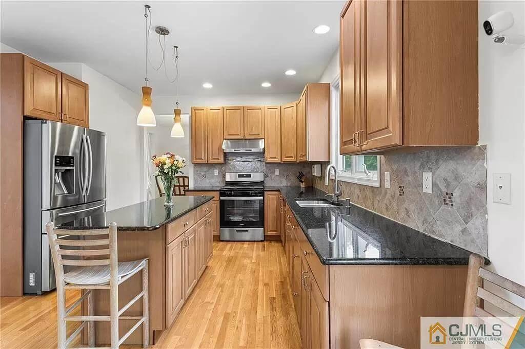 Check Out Those Sleek Granite Countertops in This Classic Kitchen