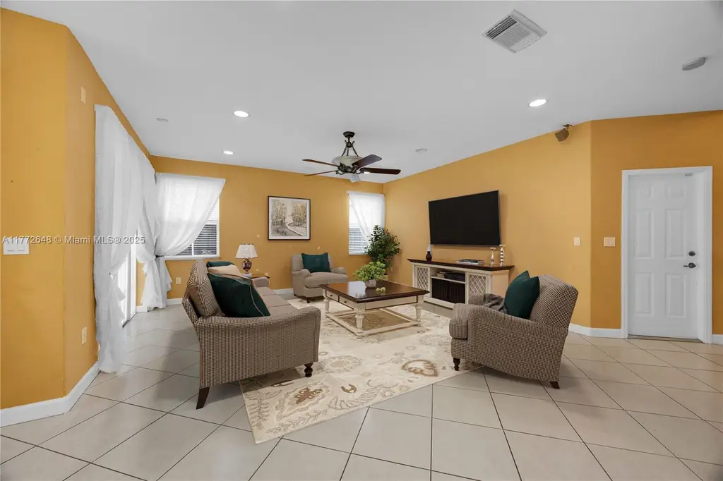 Mediterranean 4-Bedroom Revival-Style Home with Covered Patio and Two-Car Garage (2,747 Sq. Ft. Floor Plan)