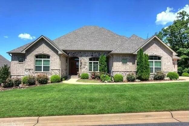 Classic Ranch Exterior with Meticulously Manicured Lawn—Check Out the Stone Accents