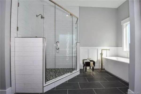Check Out the Luxurious Walk-In Shower with Textured Tiles