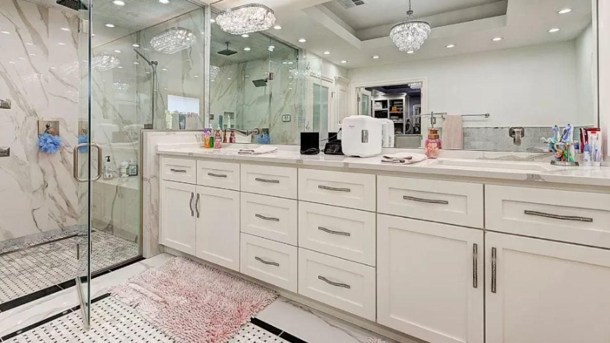 Spacious White Vanity and Luxe Walk-In Shower in a Bright Bathroom