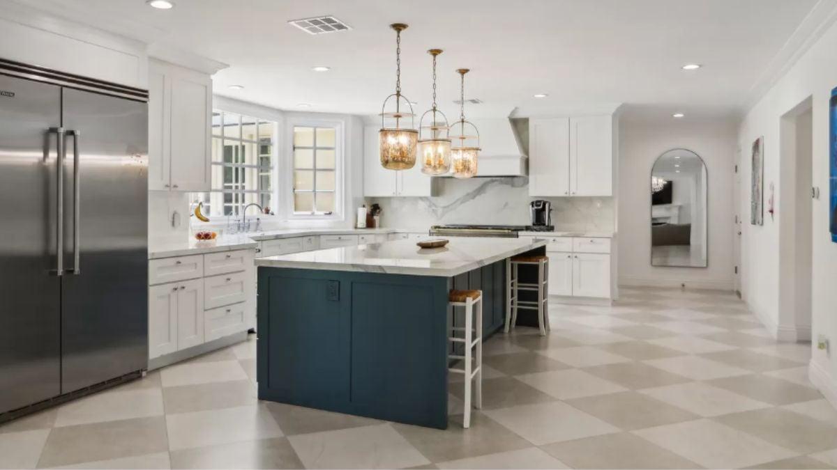 Spacious Kitchen with Bold Island and Eye-Catching Pendants