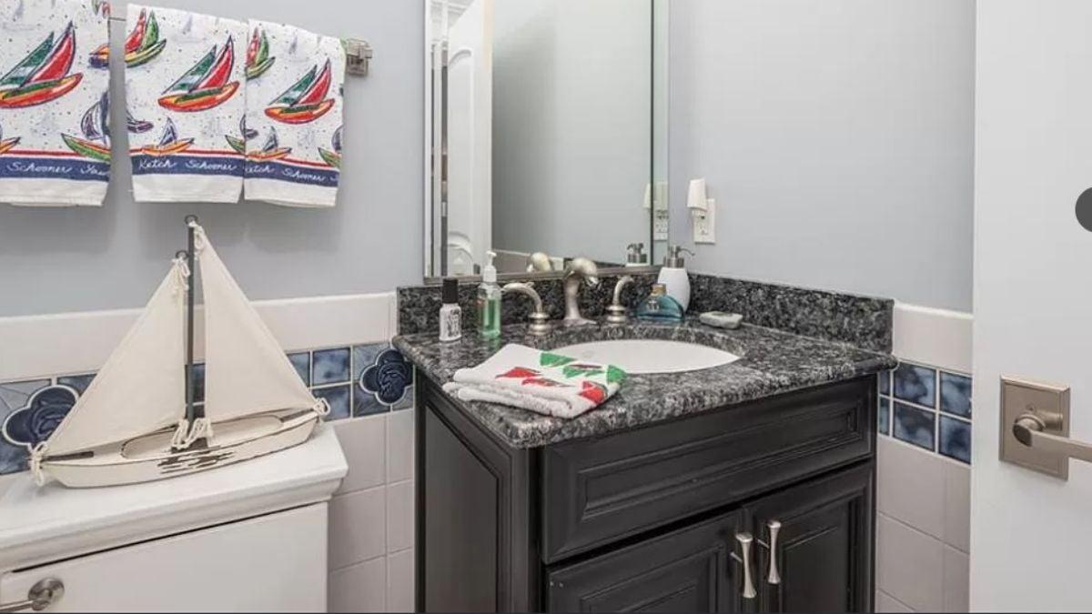 Nautical Bathroom Accents with Vibrant Towel Design