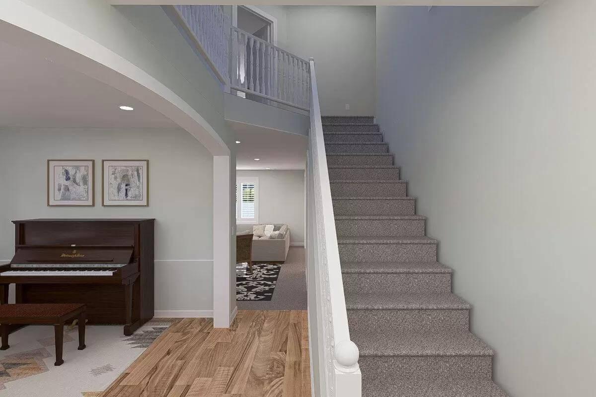 Take a Look at This Graceful Staircase and Cozy Nook with a Piano