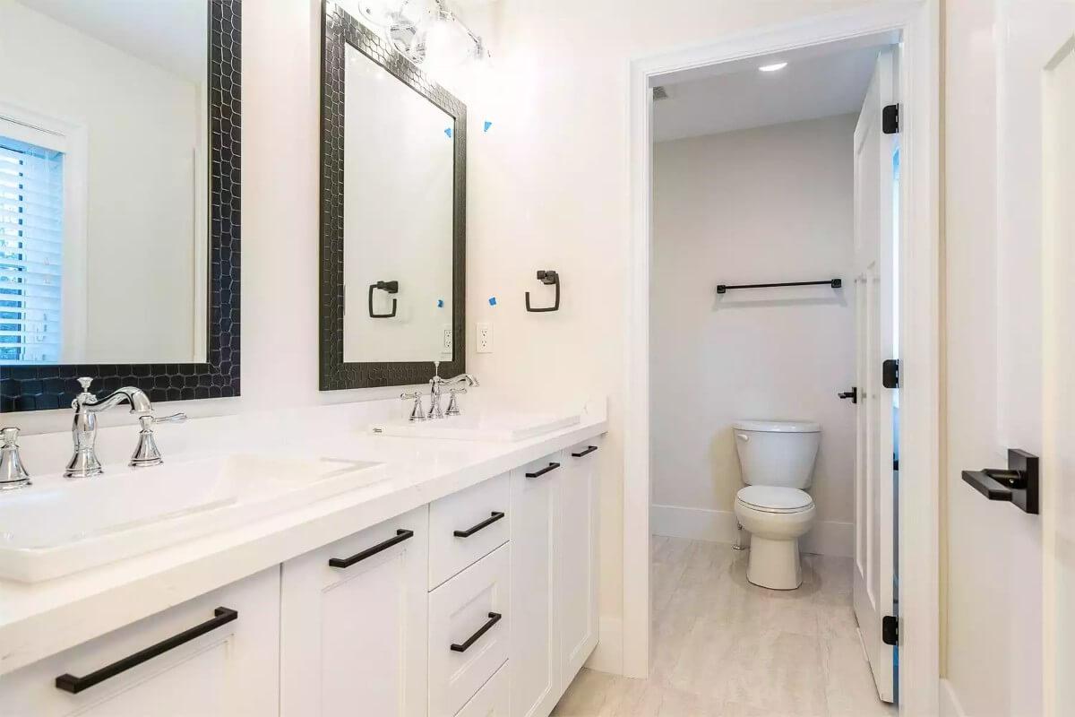 Notice the Bold Black Accents in This Elegant Bathroom Vanity