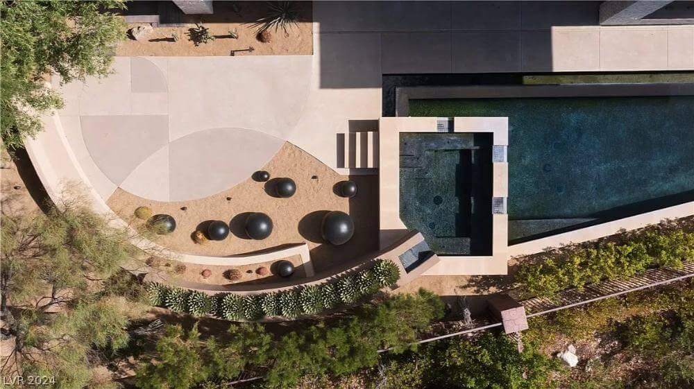 Architectural Harmony with Sculptural Landscaping and Pool Design