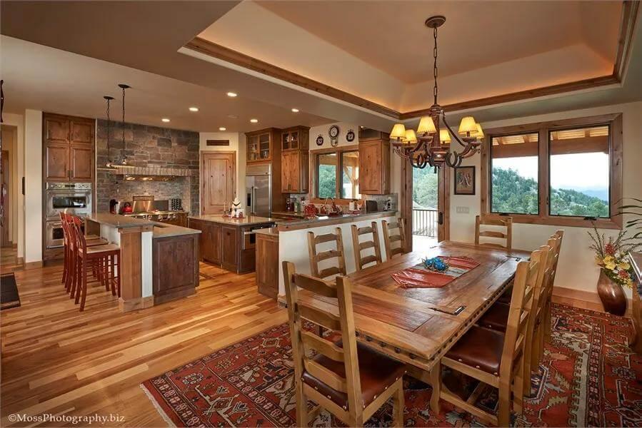 Rustic Dining Room with Beautiful Wood Details and a Stone Backsplash