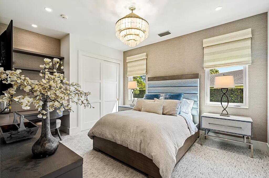 Notice the Elegant Chandelier Adding Glamour to This Bedroom