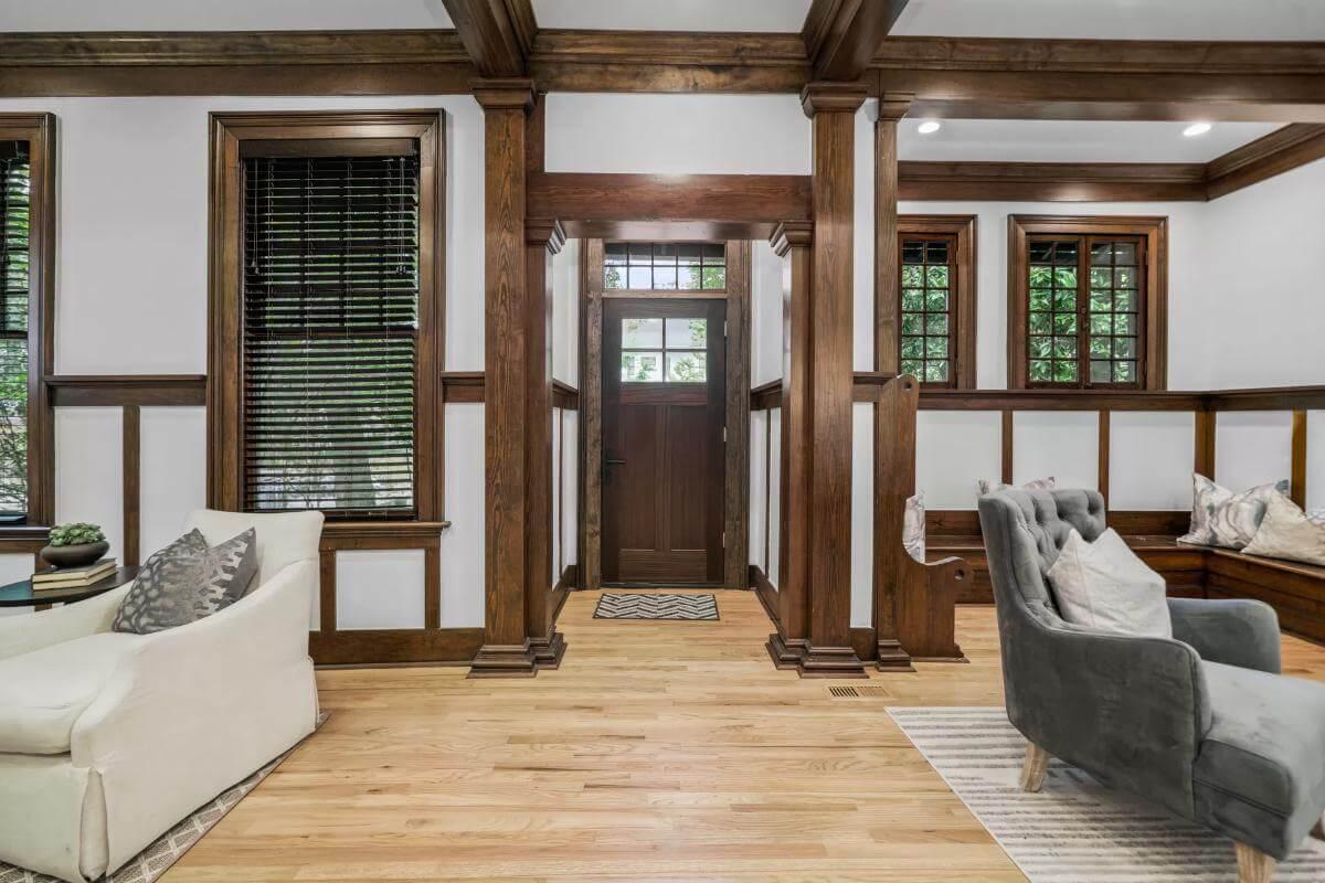 Admire the Classic Craftsman Woodwork in the Inviting Entryway