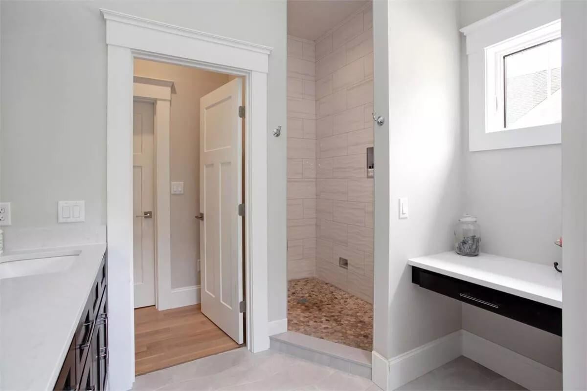 Check Out This Inviting Shower with Pebble Flooring