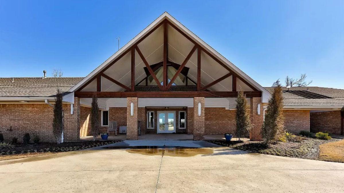 Marvel at the A-Frame Entrance and Impressive Beams in This Ranch Facade